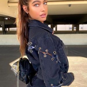 Fashion Nova edgy denim jacket with silver hoop detail.